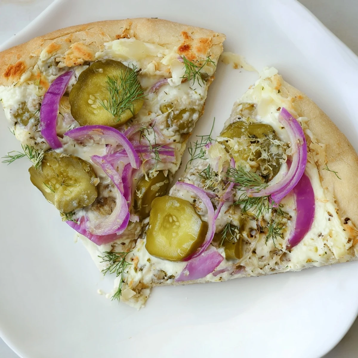 Golden crust topped with tangy sauce, mozzarella, and crunchy dill pickles.  