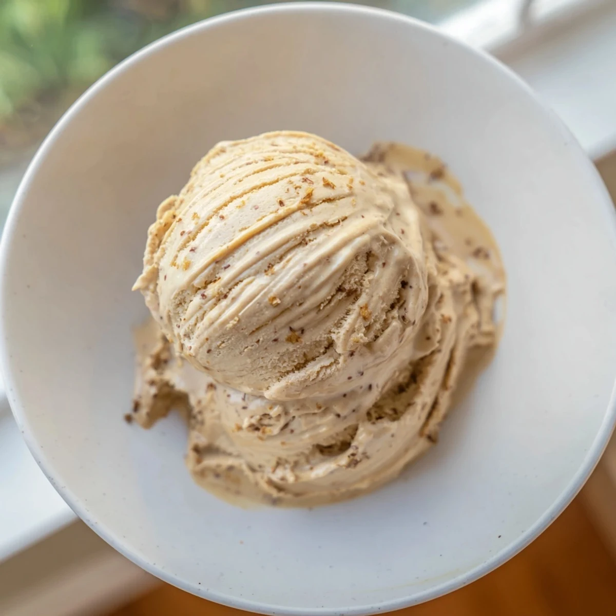Creamy peanut butter banana ice cream swirls, a healthy and delicious frozen treat to enjoy.