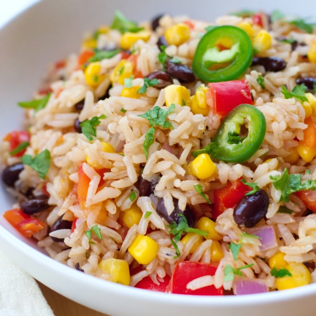 Colorful One-Pot Mexican Rice & Beans, featuring fluffy rice, beans, and vegetables—perfect for dinner.