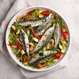 Imagine tender blue fish in Plongeons dans lOcéan Poisson Bleu with a zesty lemon-herb aroma, ready to serve.