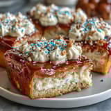 Fluffy vanilla sheet cake with creamy buttercream frosting, decorated with festive graduation sprinkles for a celebratory dessert.