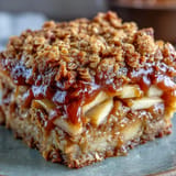 Golden Father's Day Whiskey Caramel Apple Crisp, a comforting dessert with an oat crumble topping.