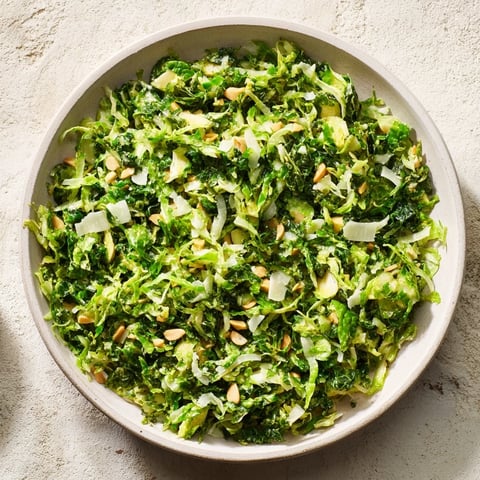 Fresh, crunchy lemon Parmesan Brussels sprouts salad, perfect bright flavors in a simple veggie dish.