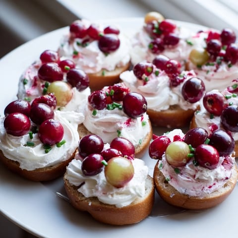 Festive Cranberry Sleigh Bagel Board: a colorful spread of sliced bagels, smoked salmon, and fresh fruit.