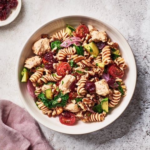 Pasta Salad with Cranberry Vinaigrette: A colorful bowl of chilled pasta tossed in a tangy dressing.