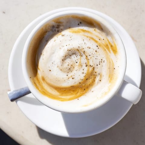 Savory Onion Latte combines rich espresso and sweet caramelized onions for a unique drink.  