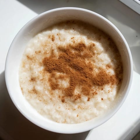 This comforting Rice Pudding with Leftover Rice features a smooth texture and sweet cinnamon flavor.